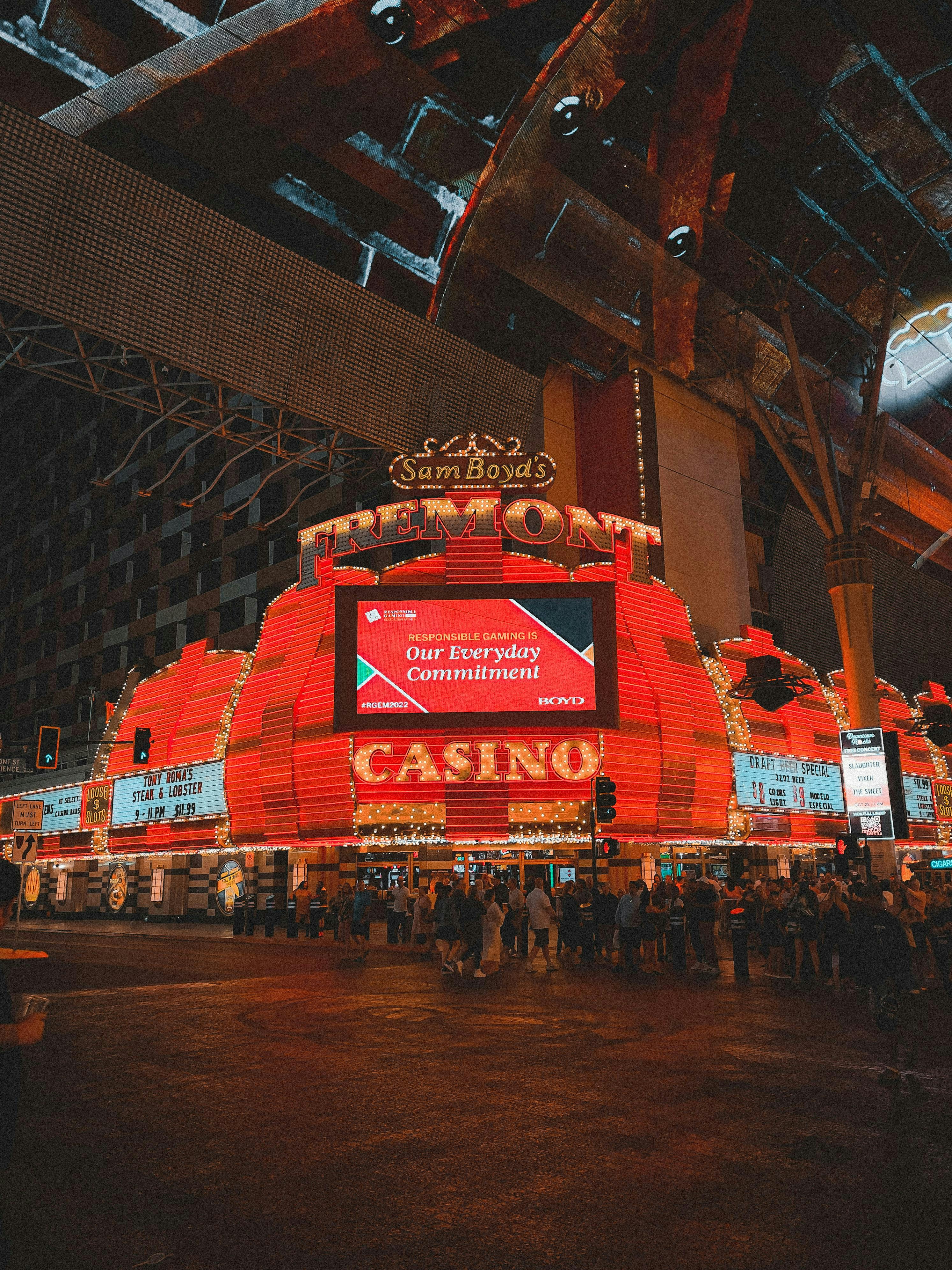 A casino building with people standing in front of it